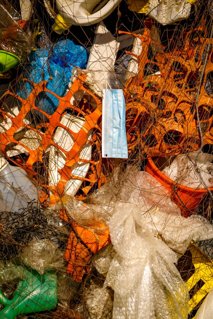 creative-approach-img Close-up of a pile of mixed waste highlighting pollution and recycling issues.