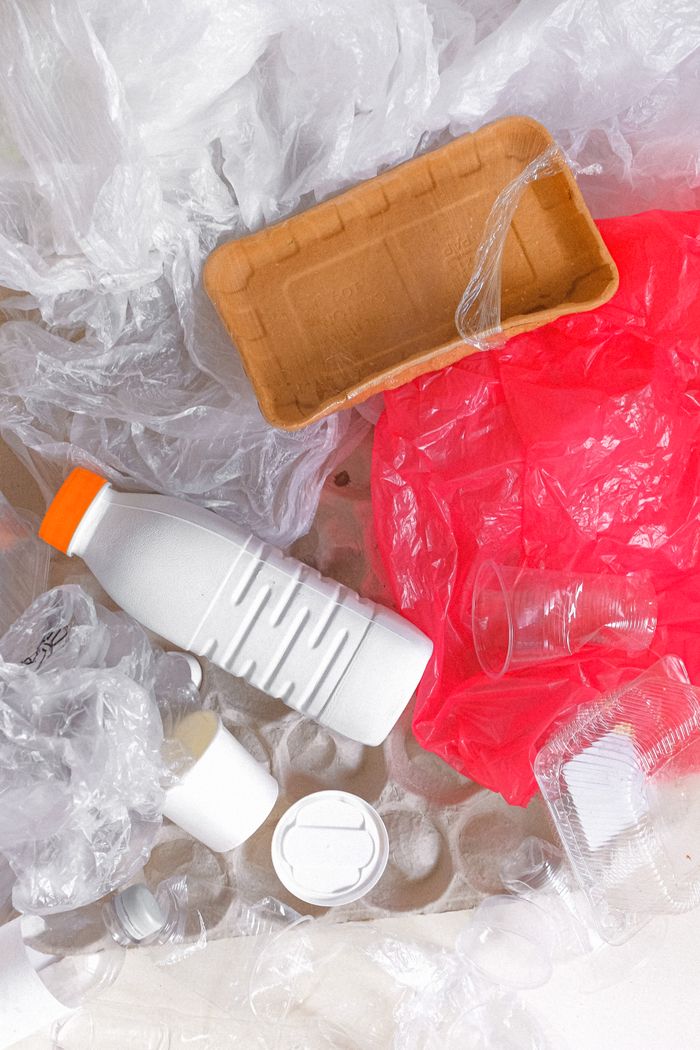 Overhead view of mixed plastic waste for recycling awareness.